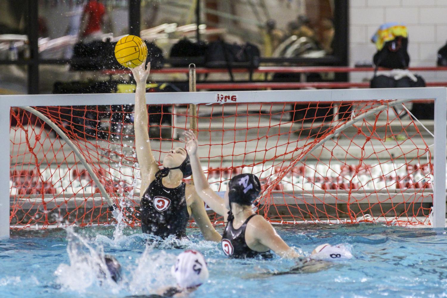 <a href='http://kybt.cuentascorrientes.net/'>BETVLCTOR伟德登录</a> student athletes compete in a water polo tournament on campus.
